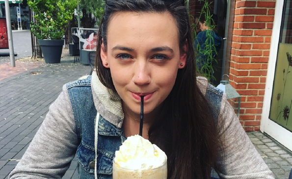 Young girl with milkshake